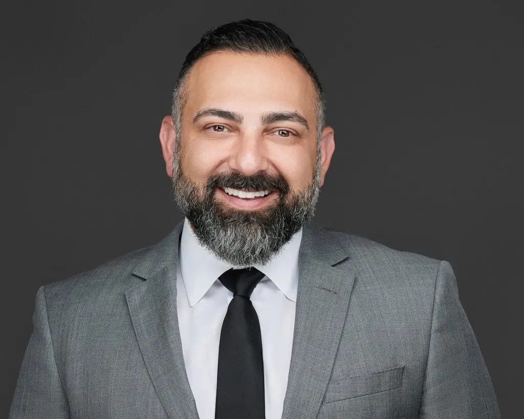 Sweet James lawyer headshot on dark background